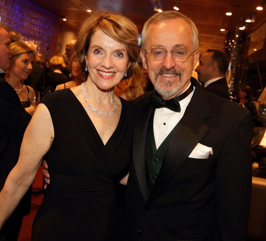 Prof. Larson with Elizabeth at a formal celebration